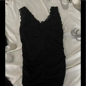 Black tank. Top is lace, rest is silky